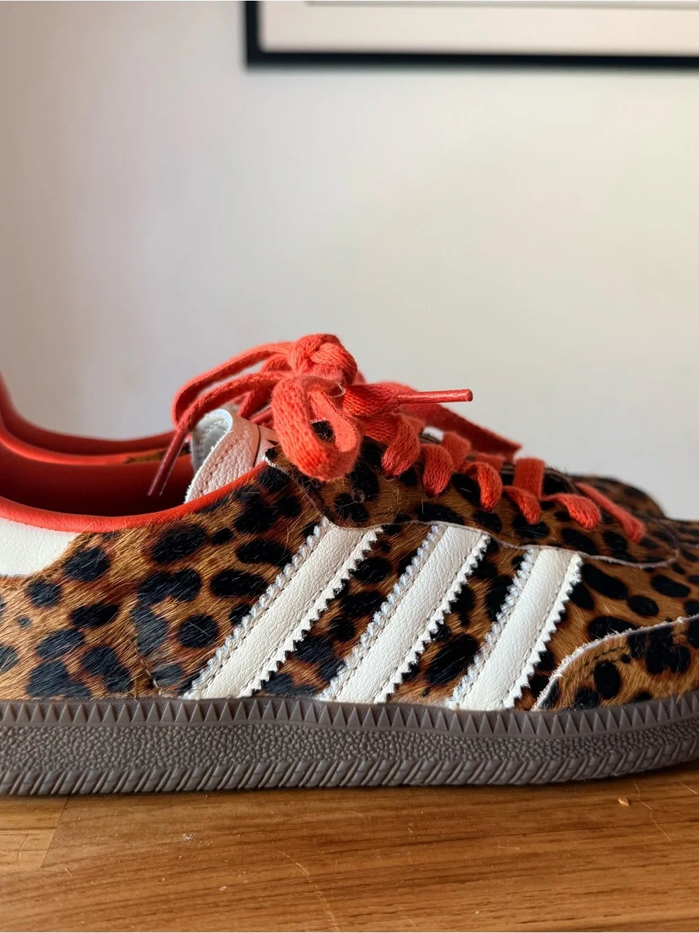Adidas Originals samba sneakers in leopard print with red and white laces.